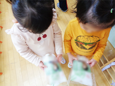 幼稚園と保育園の園児および保護者に向けた特産ブランド米と商品紹介リーフレットのサンプリング事例3