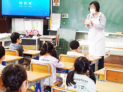 清潔指導の一環として幼稚園・保育園と小学校の児童・保護者に向けたシャンプー&コンディショナーのサンプリング事例4