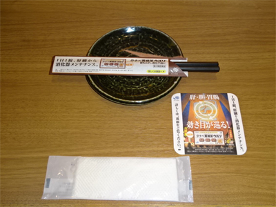 大手居酒屋チェーンMの店舗でのコースター広告2