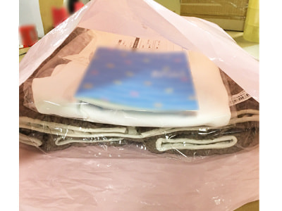 流行に敏感な女性に向けた商業施設内女性向けスパ×有名ガイドブックのコラボ冊子のサンプリング事例2