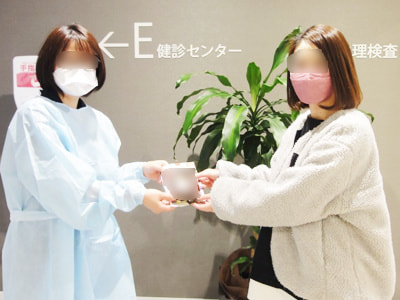 人間ドック受診者に向けた栄養素を豊富に含むヘルシーなクッキーのサンプリング事例1